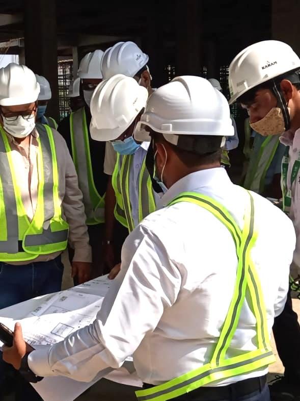 Site review with contractors during construction